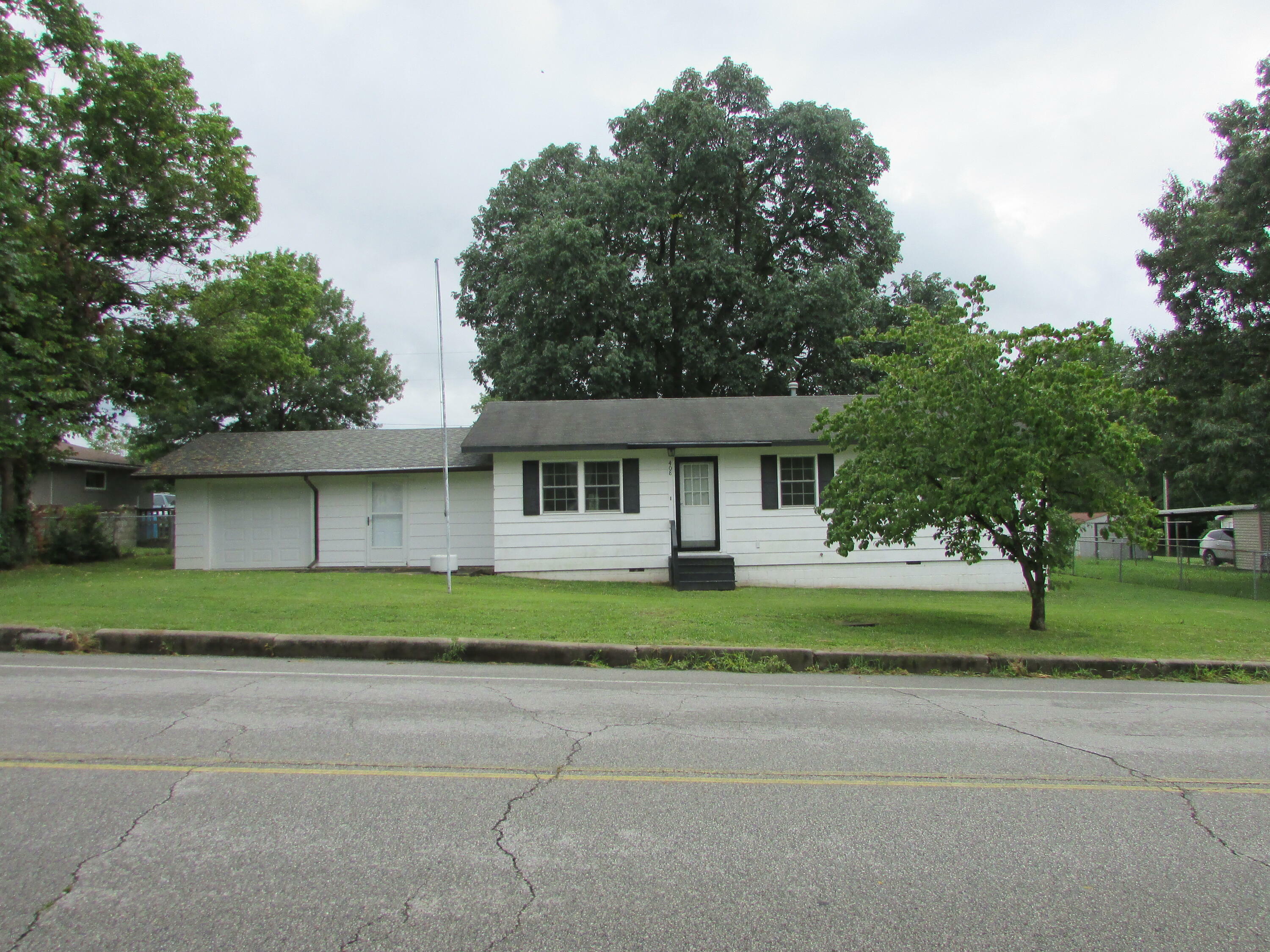 Property Photo:  408 Cedar Street  MO 64831 