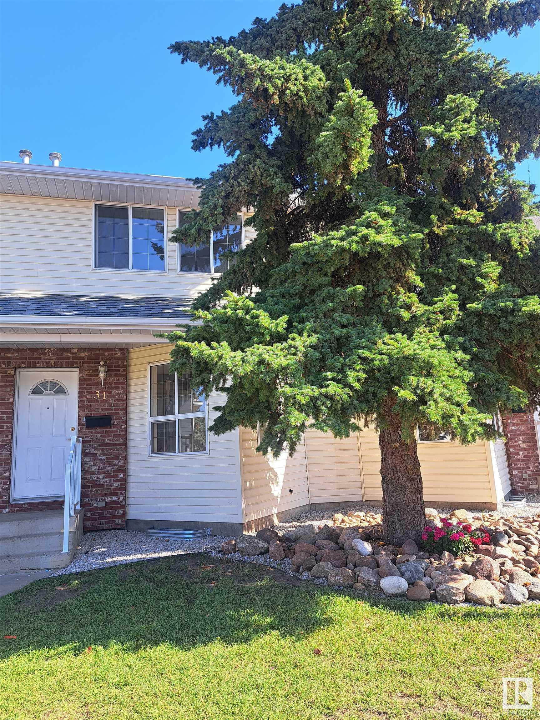 Property Photo:  1033 Youville Drive NW 31  AB T6L 6V9 