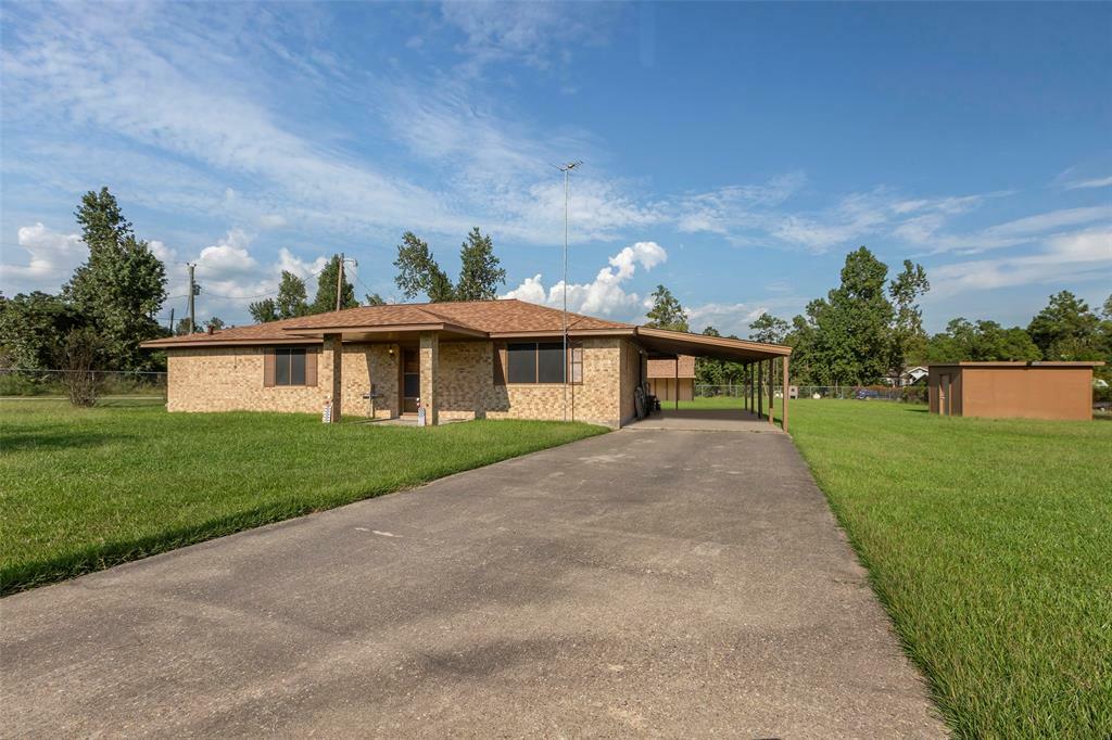 Property Photo:  302 Walnut Cove  TX 77360 