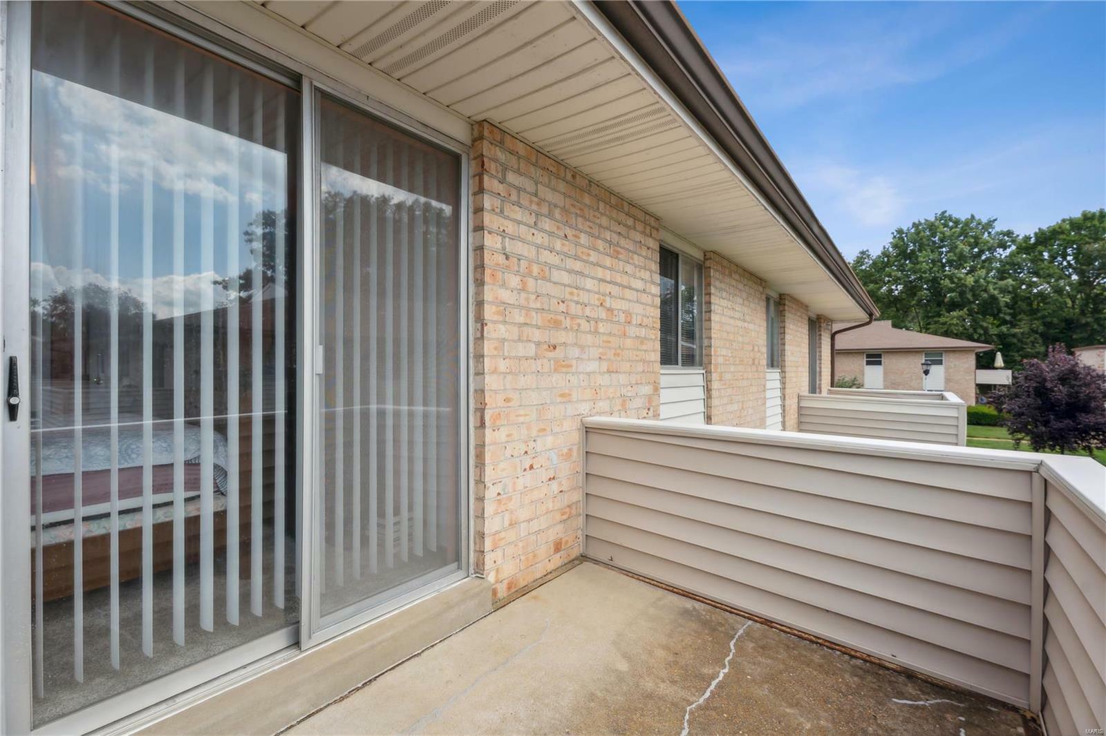 Property Photo:  10117 Sakura Drive F  MO 63128 