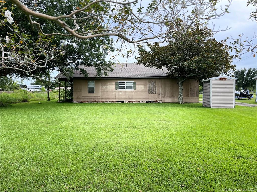 Property Photo:  1209 W Tank Farm Road  LA 70605 