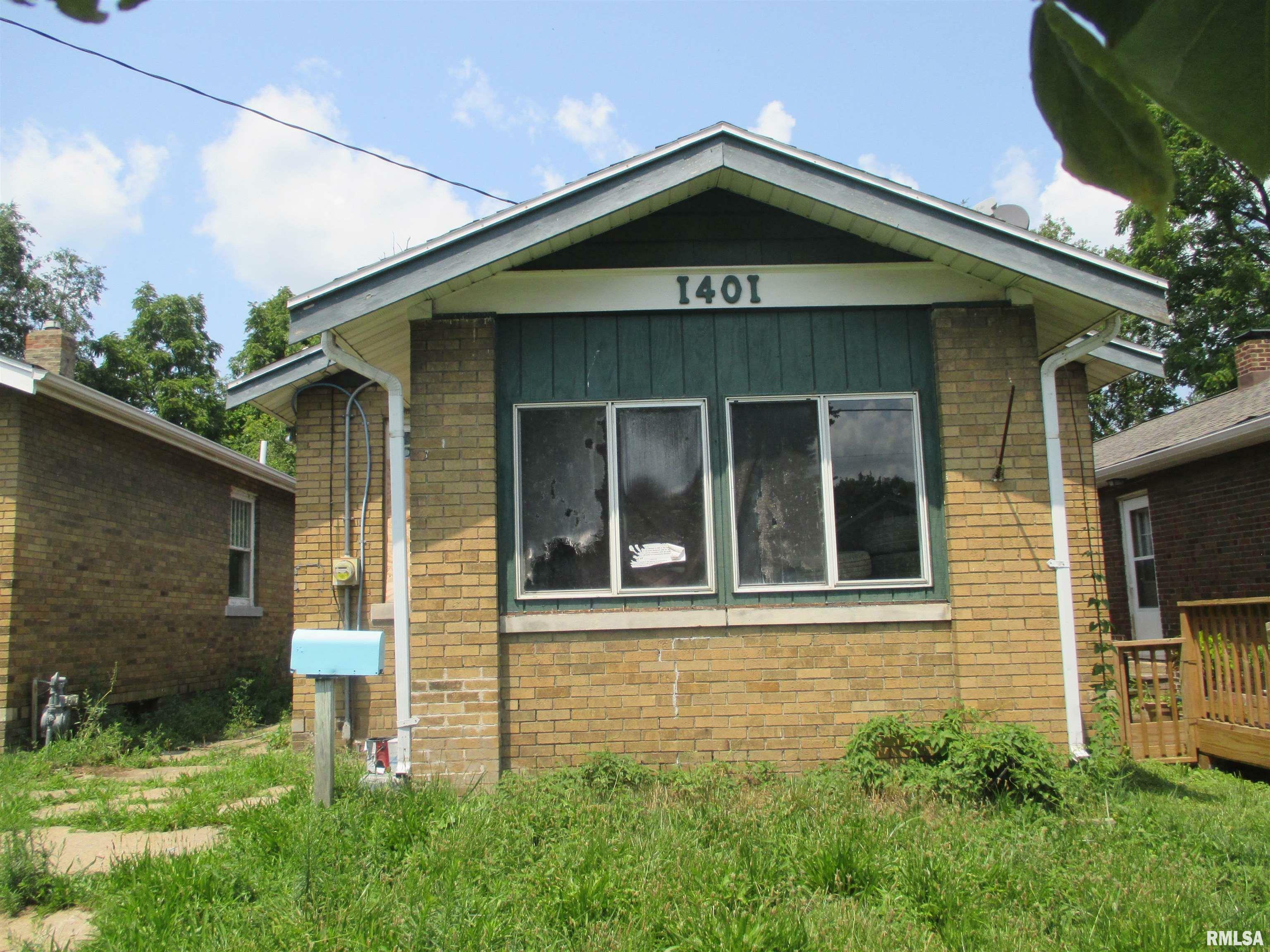 Property Photo:  1401 E Rouse Avenue  IL 61614 