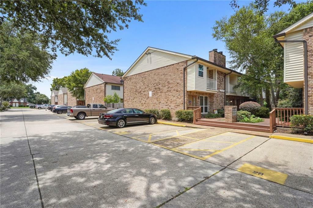 Property Photo:  1012 St Julien Drive E-2  LA 70065 