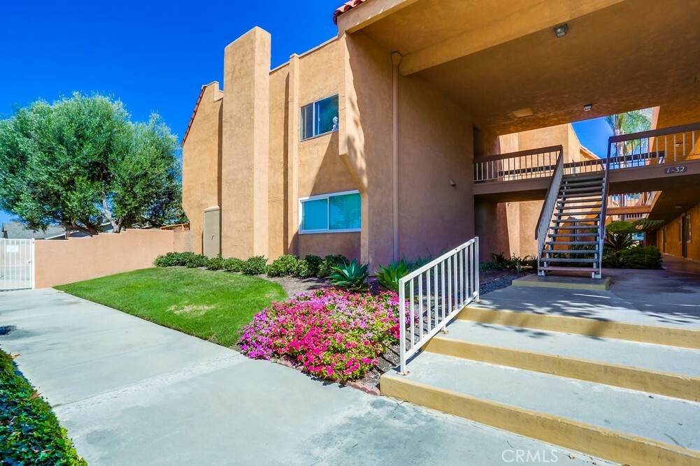 Property Photo:  6600 Warner Avenue 28  CA 92647 