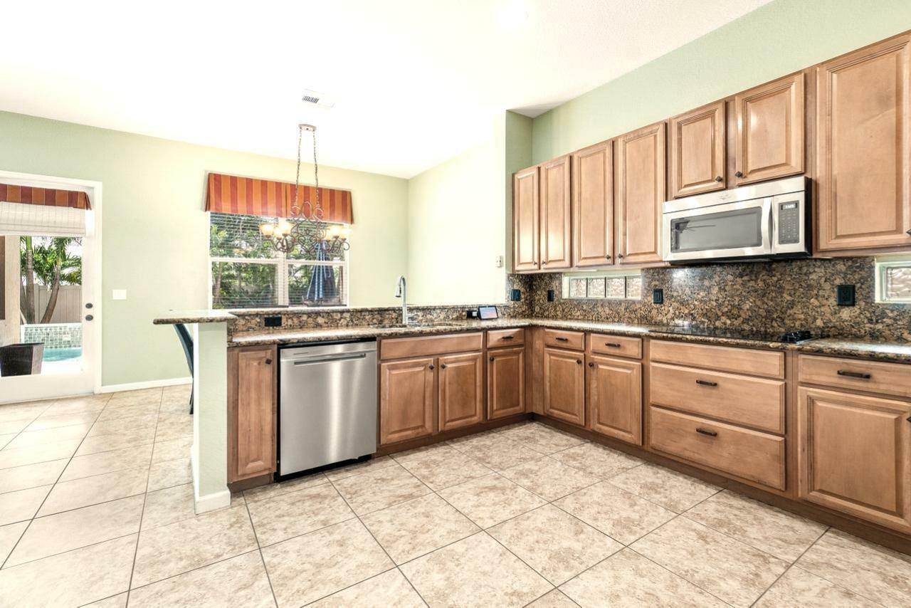 Property Photo:  4304 Pomelo Boulevard  FL 33436 