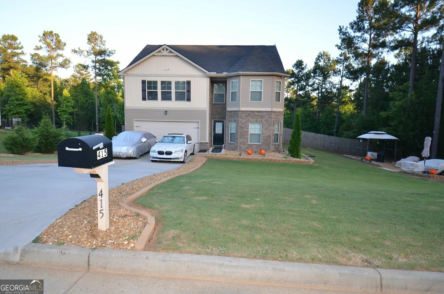 Property Photo:  415 White Pine Drive  GA 30233 