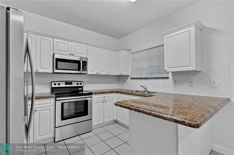 Property Photo:  2730 NE 4th St 105  FL 33033 