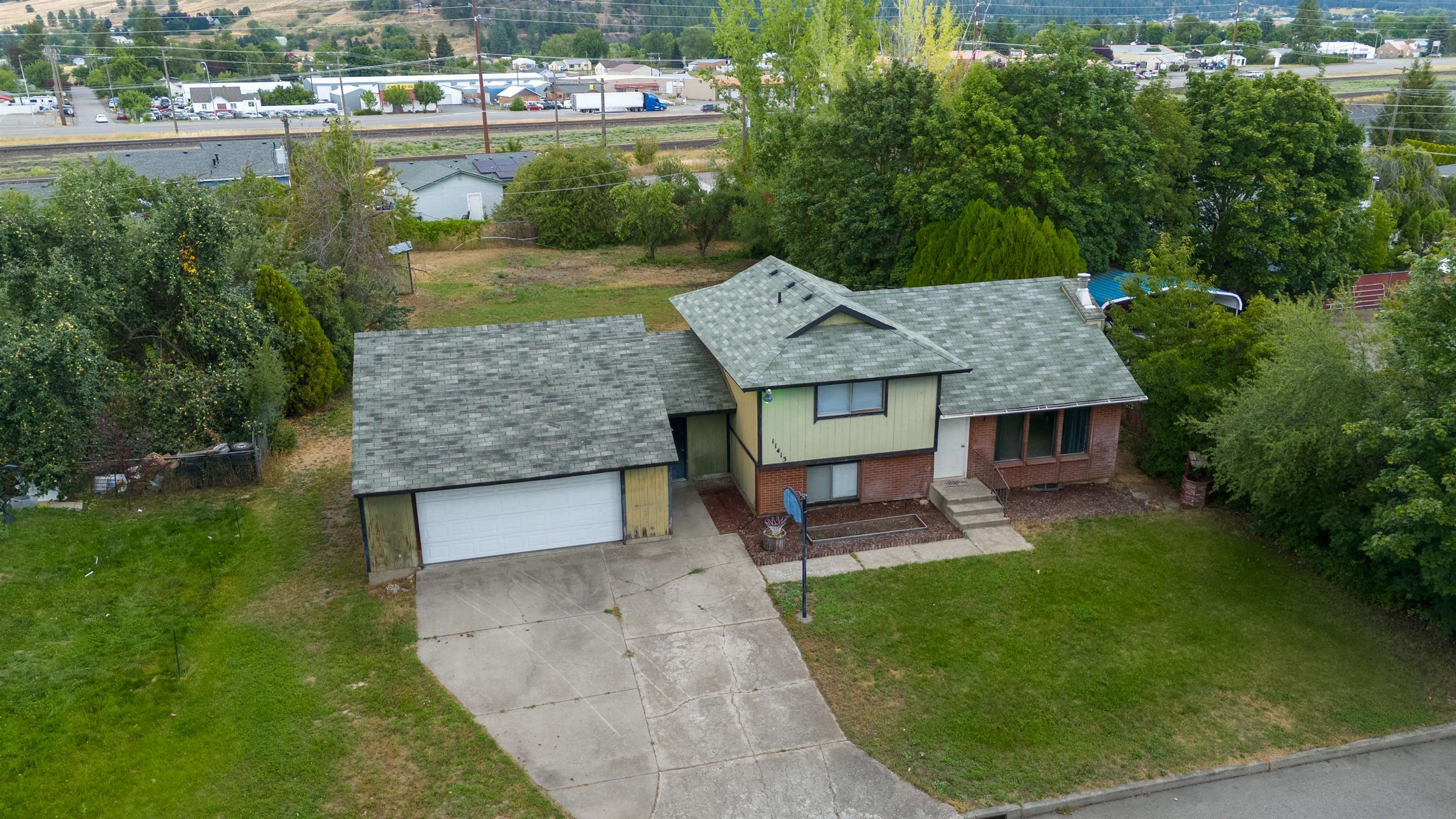 Property Photo:  11413 E Frederick Ave  WA 99206 