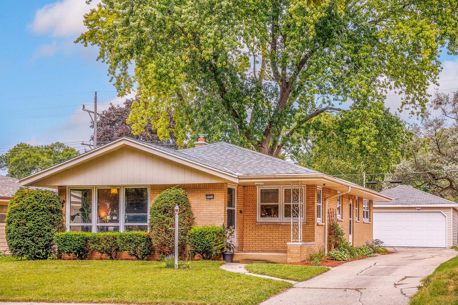 Property Photo:  8840 W Palmetto Ave  WI 53225 