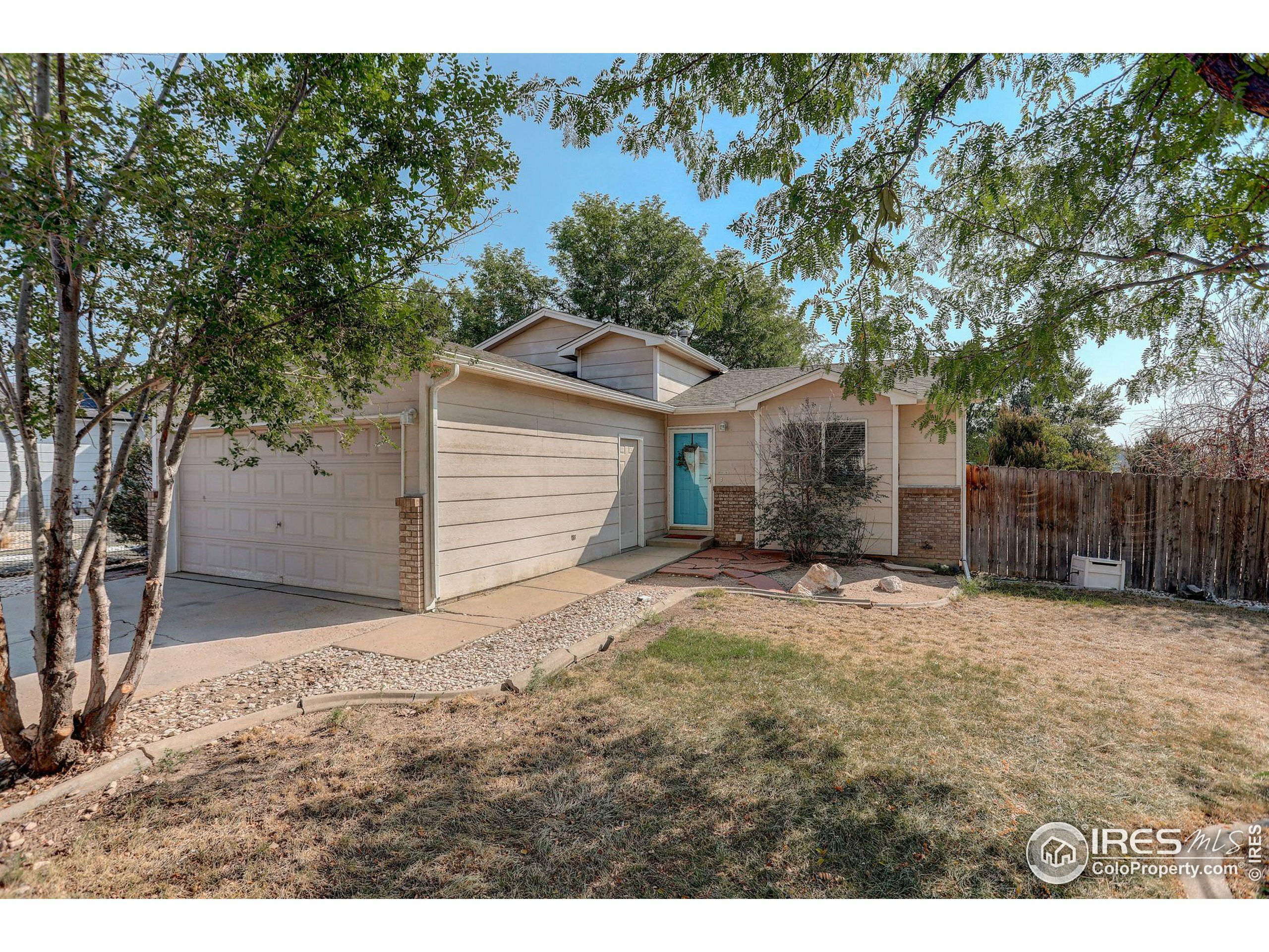 Property Photo:  1912 Almond Ave  CO 80631 