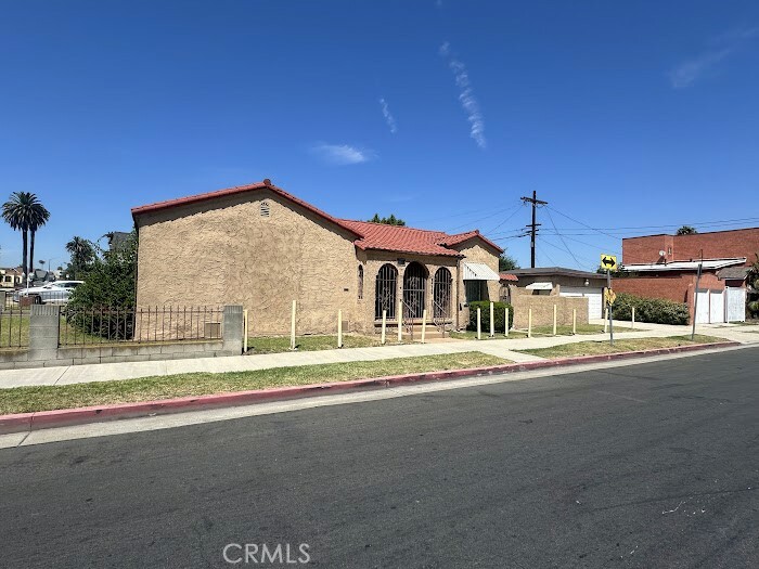 Property Photo:  8329 Raymond Avenue  CA 90044 