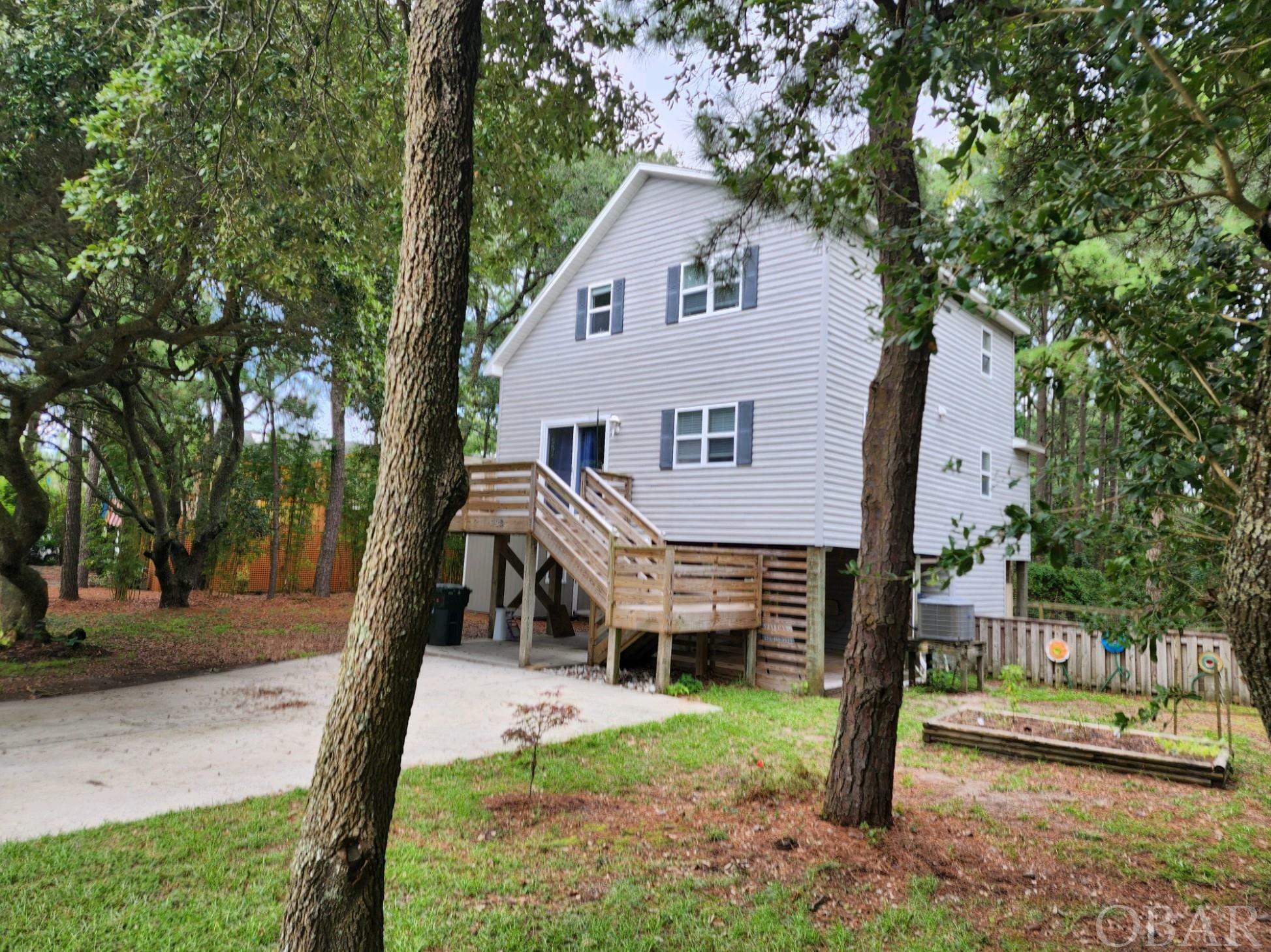 Property Photo:  113 W Windjammer Road  NC 27959-9999 