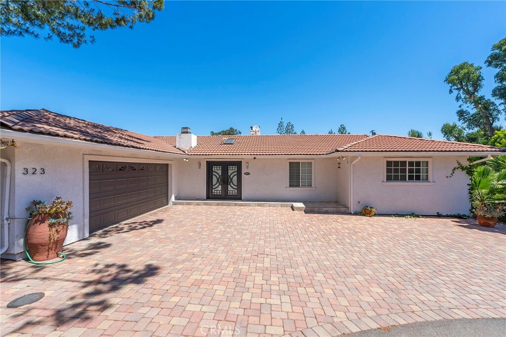 Property Photo:  323 S Del Giorgio Road  CA 92808 