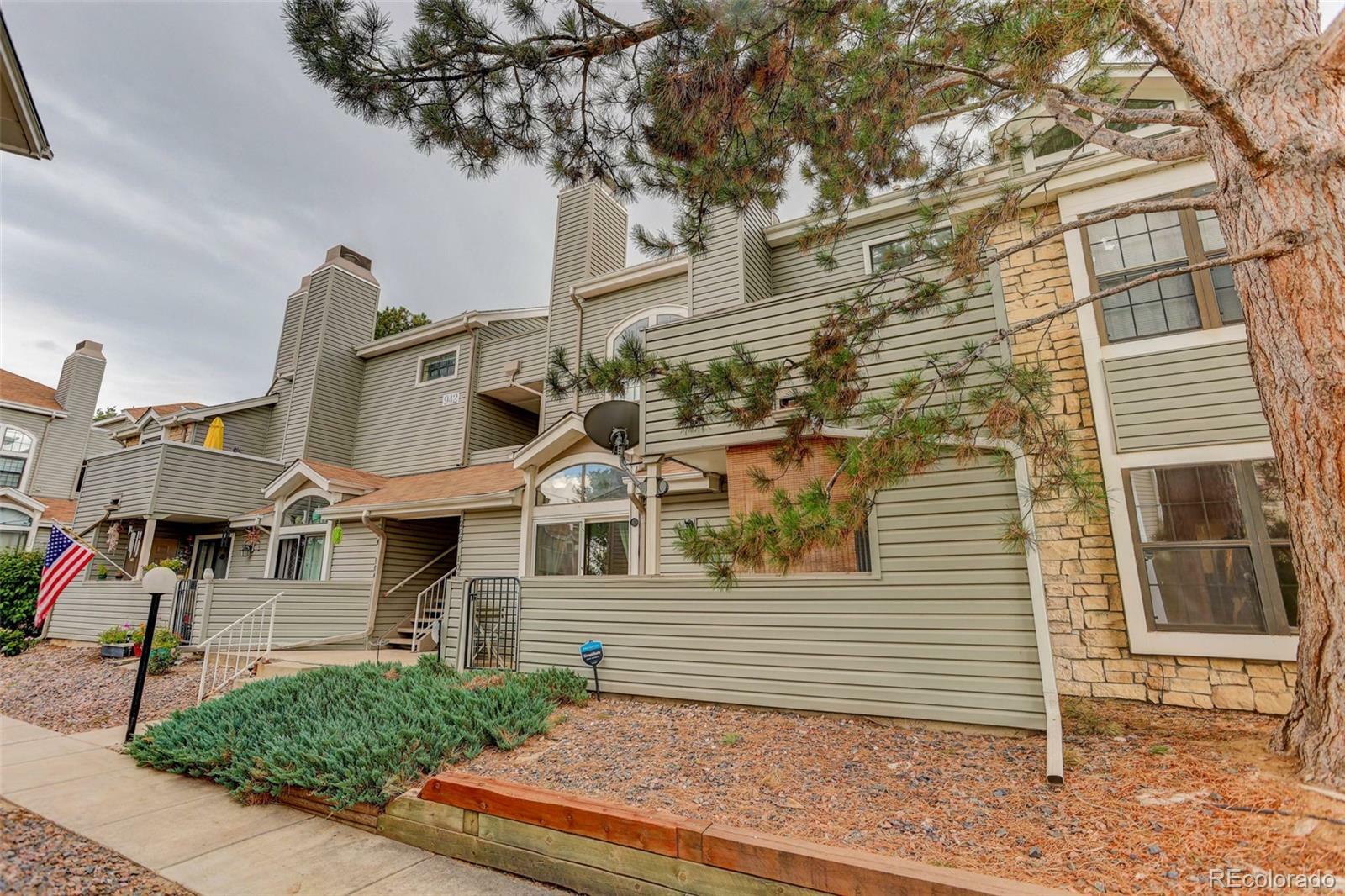 Property Photo: 942 S Walden Street 103 CO 80017