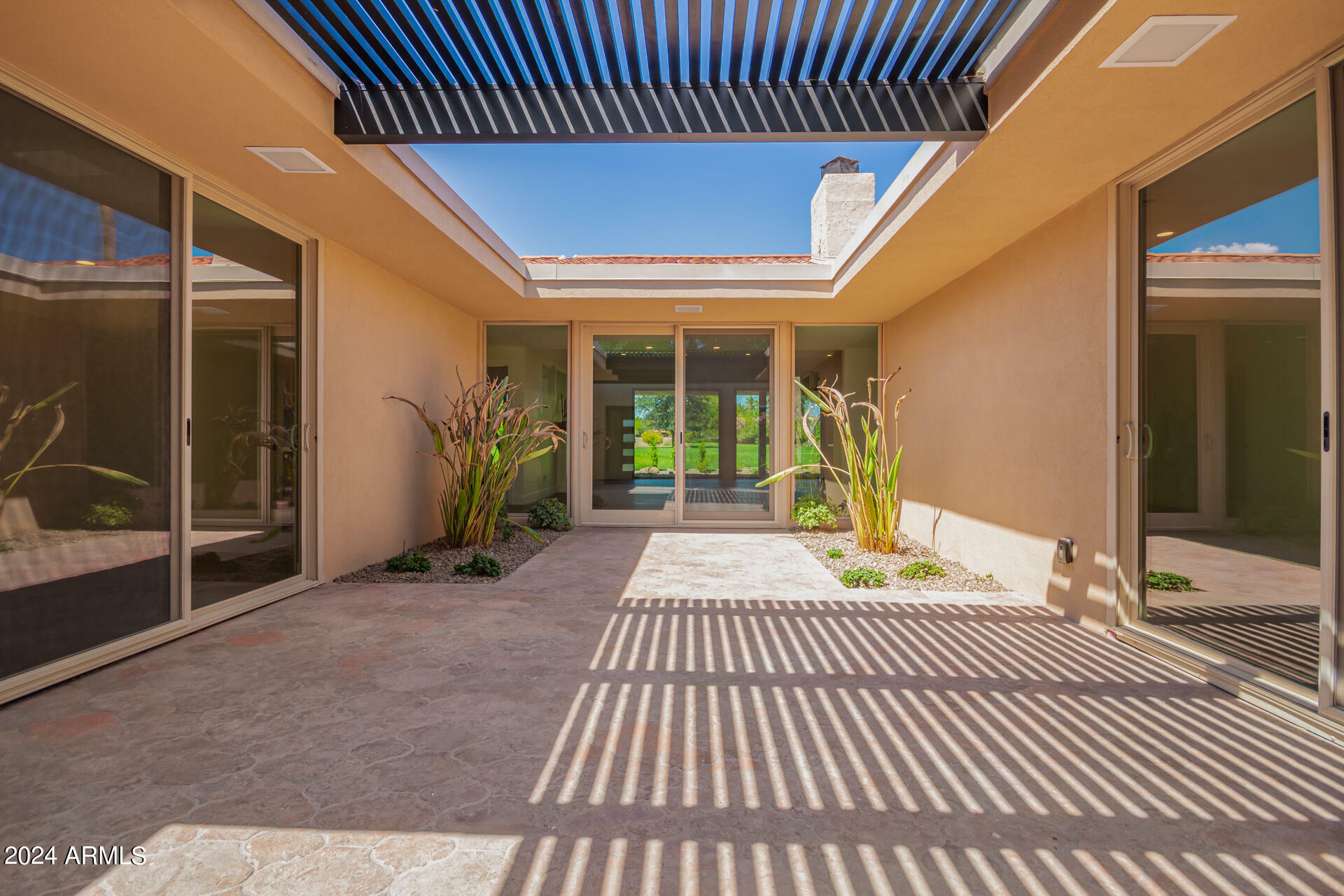 Property Photo:  7806 E San Carlos Road  AZ 85258 