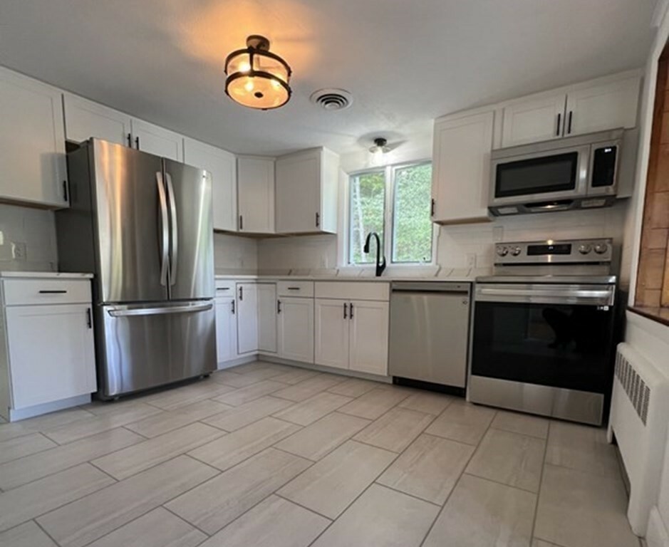 Property Photo:  165 Elwell St  MA 02148 