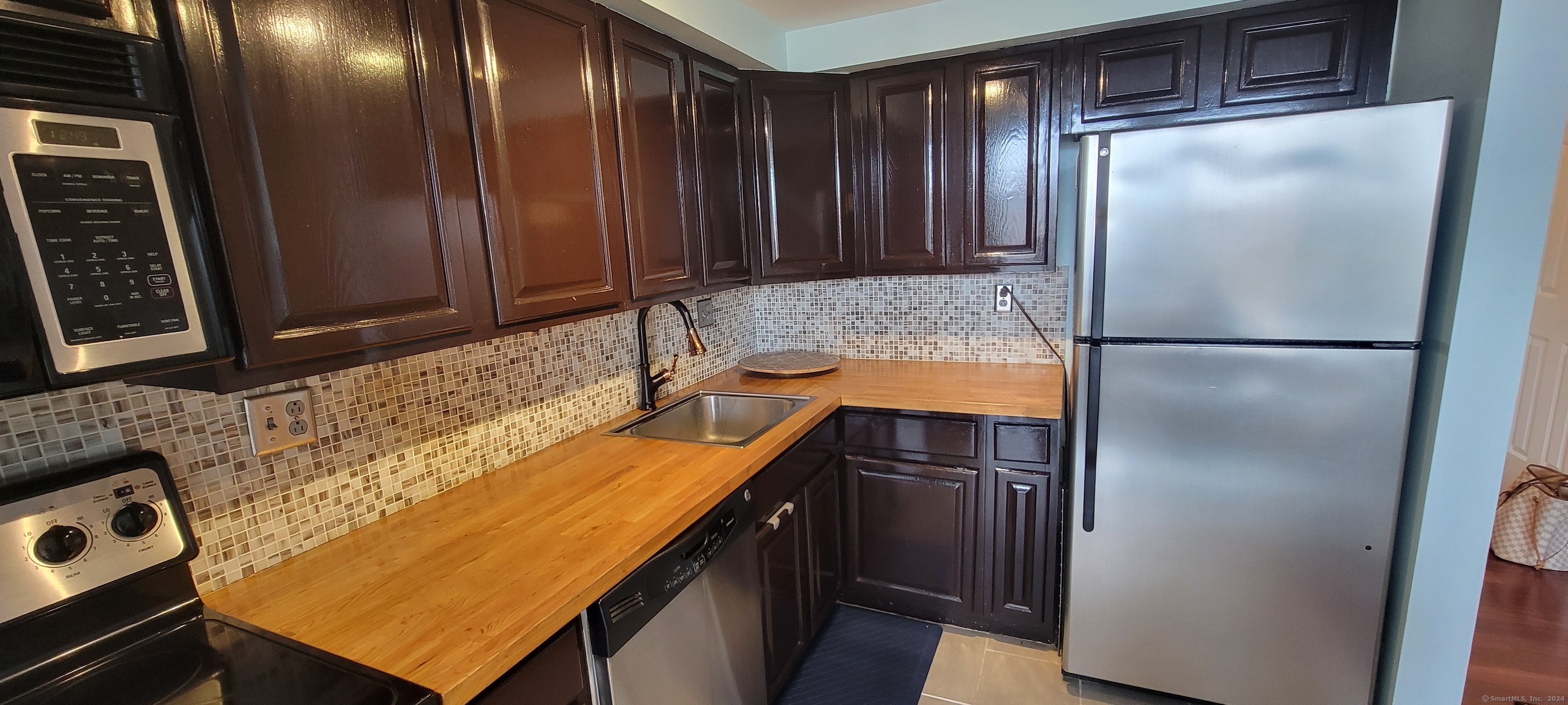 Property Photo:  25 Grand Street Apt 208  CT 06851 