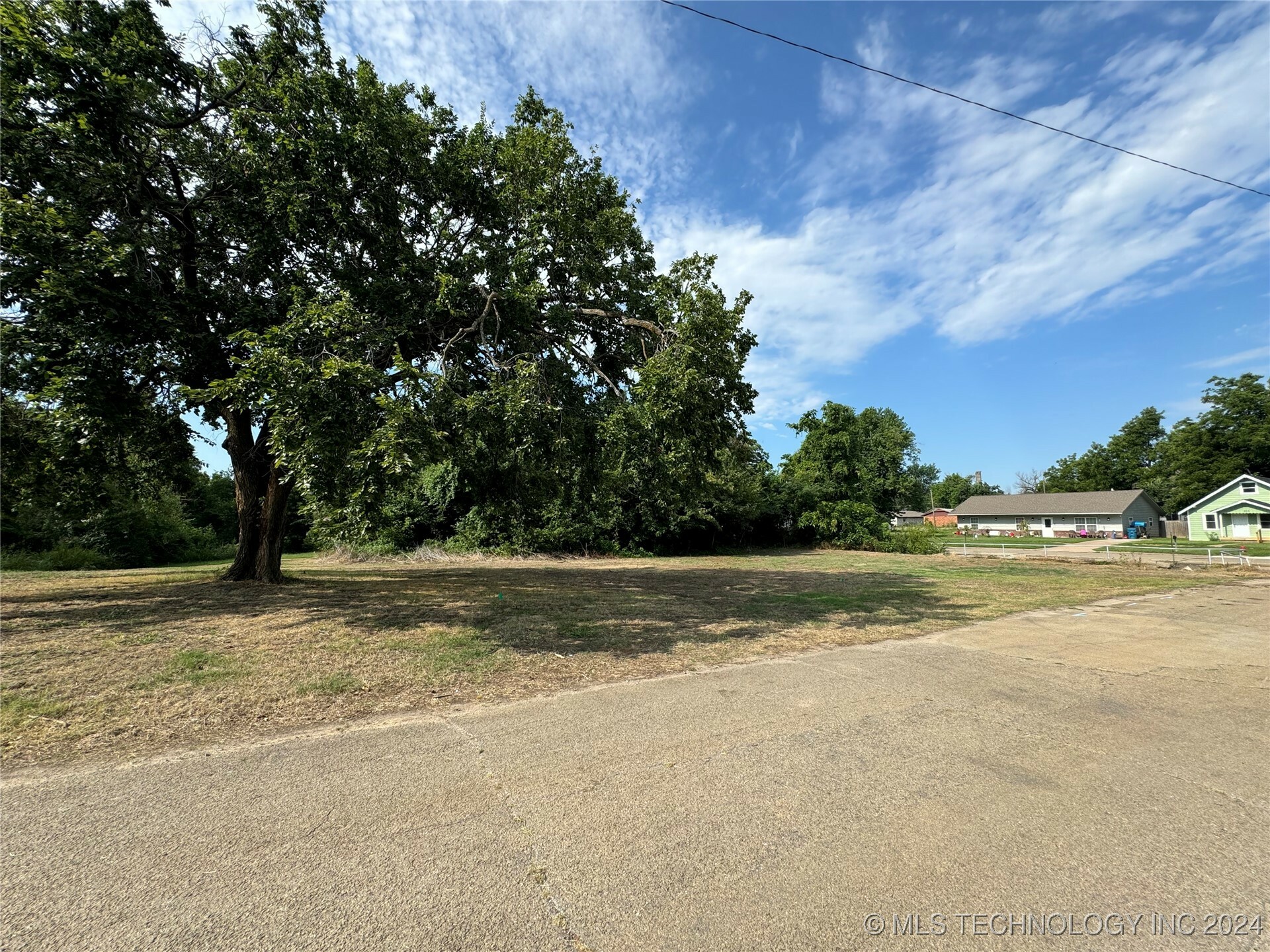 Property Photo:  203 E 2nd  OK 74023 