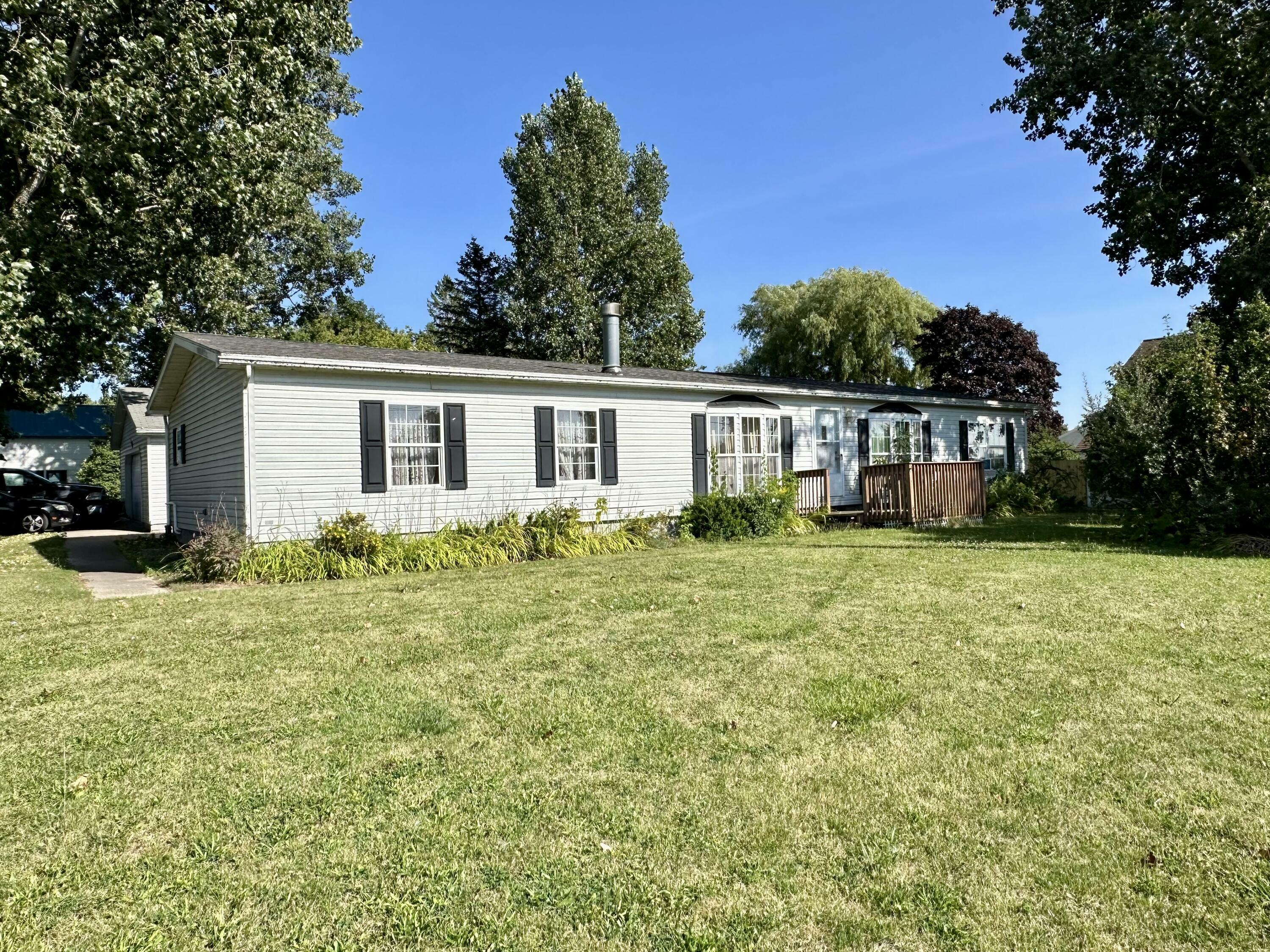 Property Photo:  208 E Seymour Street  MI 49721 