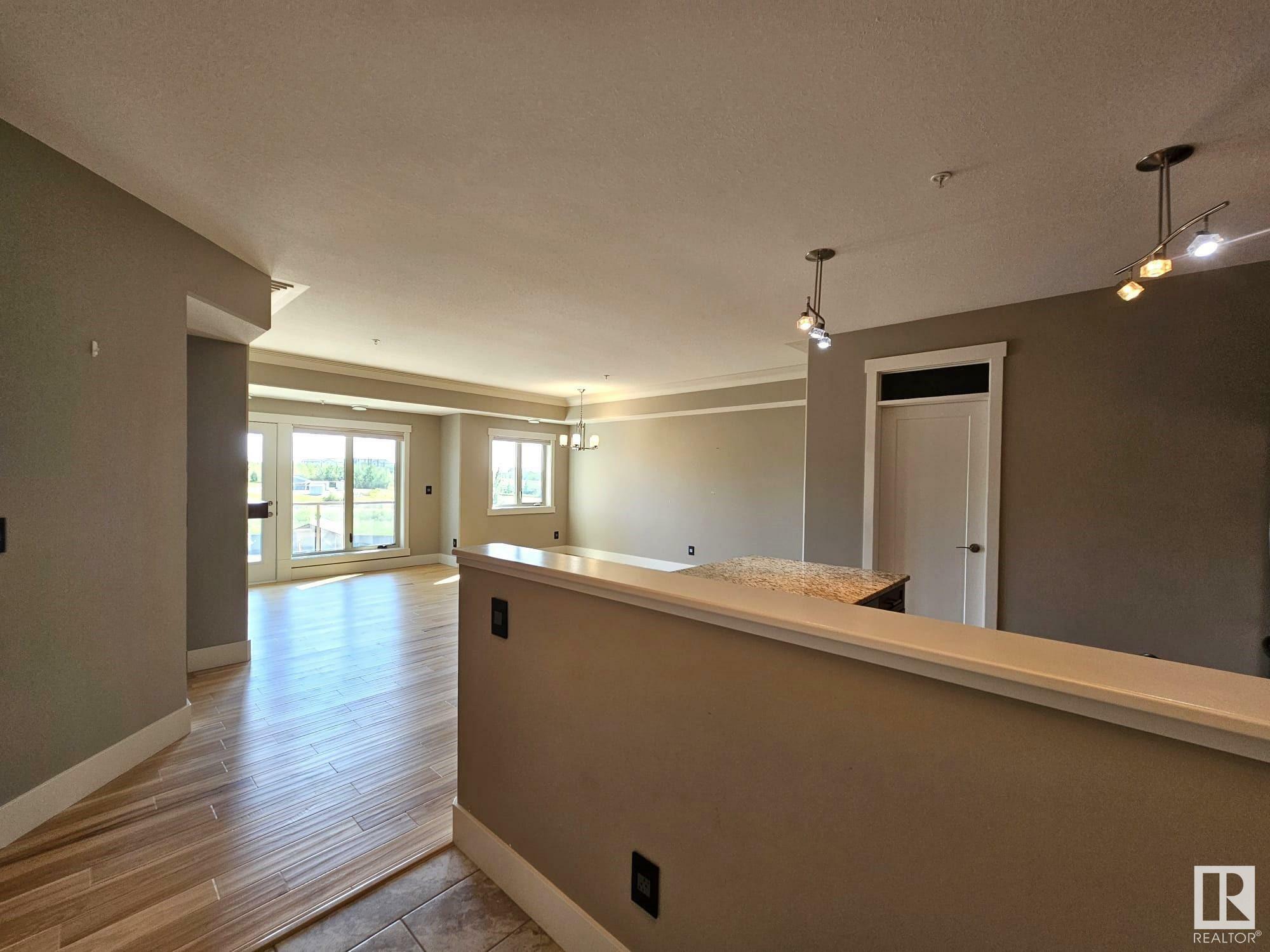 Property Photo:  5201 Brougham Drive 306  AB T7A 0C8 