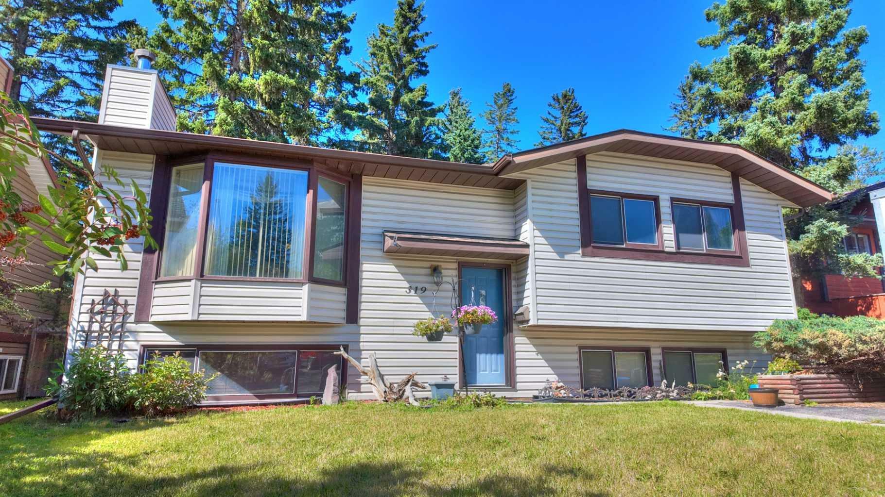 Property Photo:  319 Silvertip Close  AB T1W 1B6 