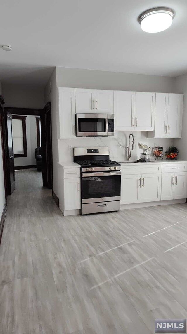 Property Photo: 55 Barbour Street 1 NJ 07508