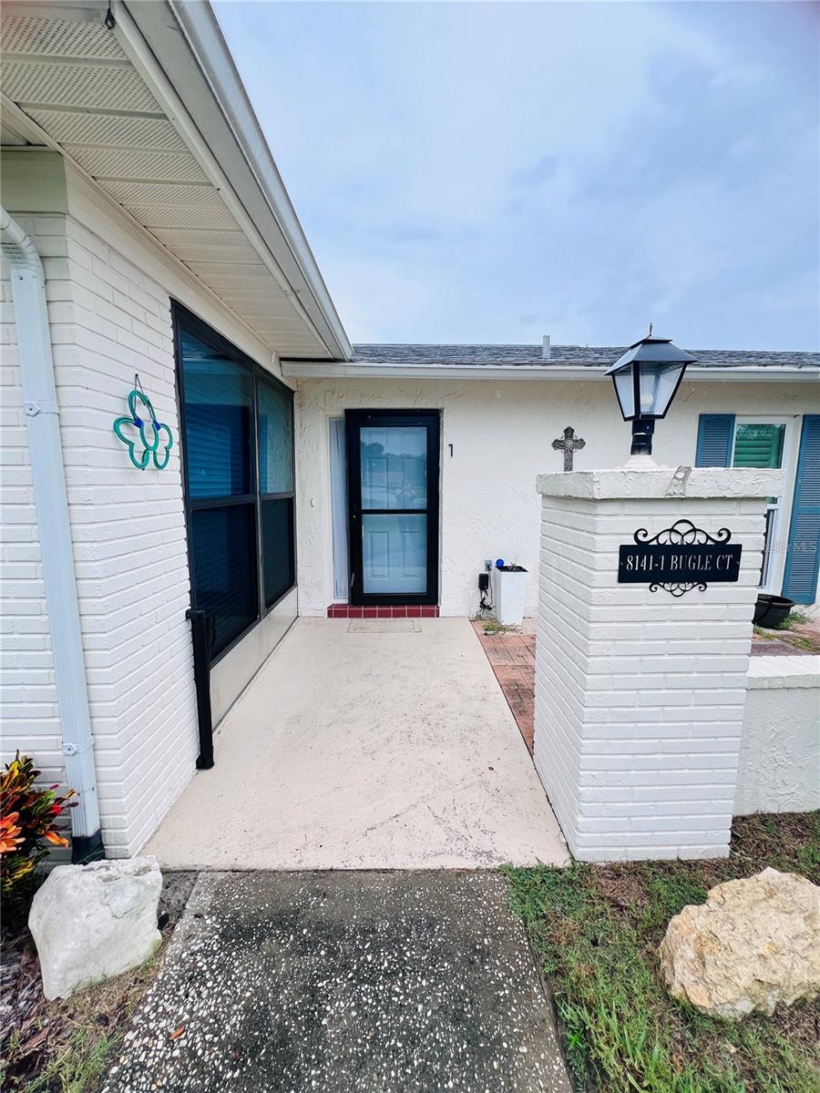 Property Photo:  8141 Bugle Court 1  FL 34668 