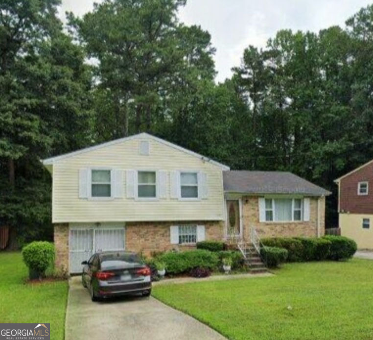 Property Photo:  6695 Hidden Brook Trail  GA 30349 