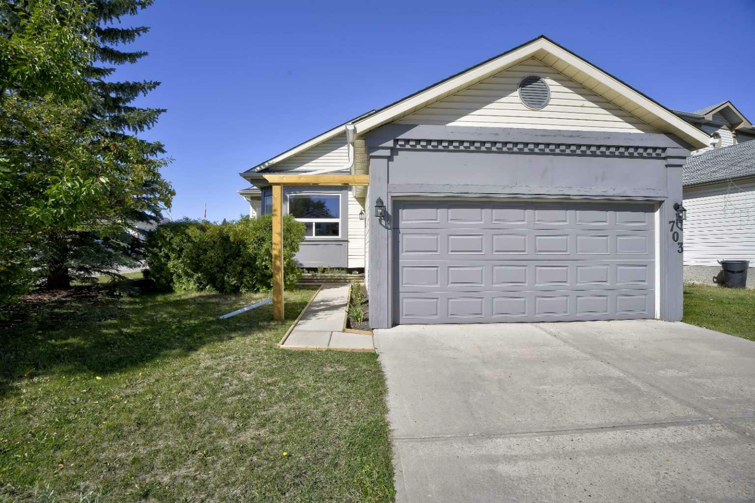 Property Photo:  703 Woodside Drive NW  AB T4B 2G9 