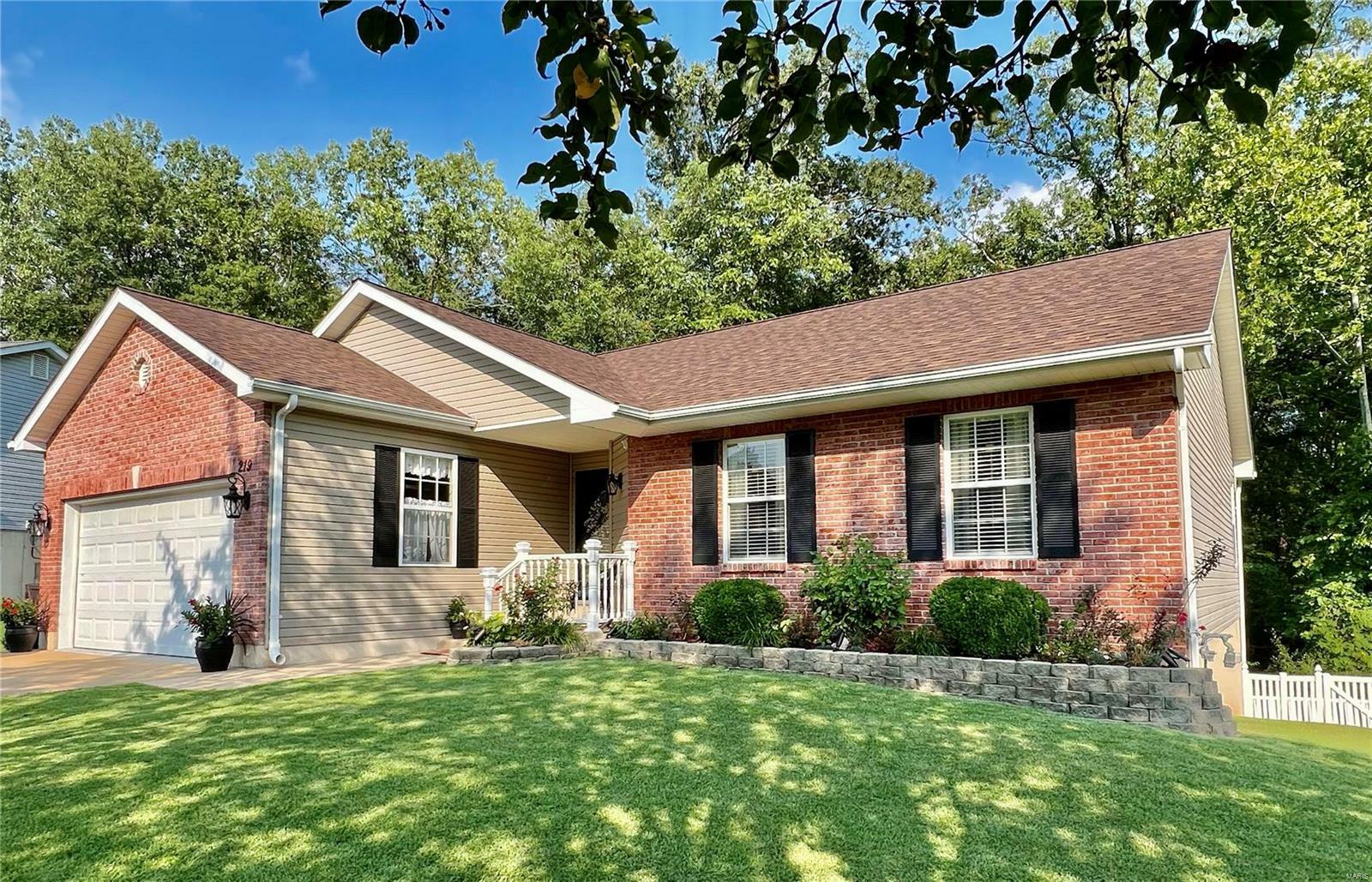 Property Photo:  219 Williamsburg Drive  MO 63019 