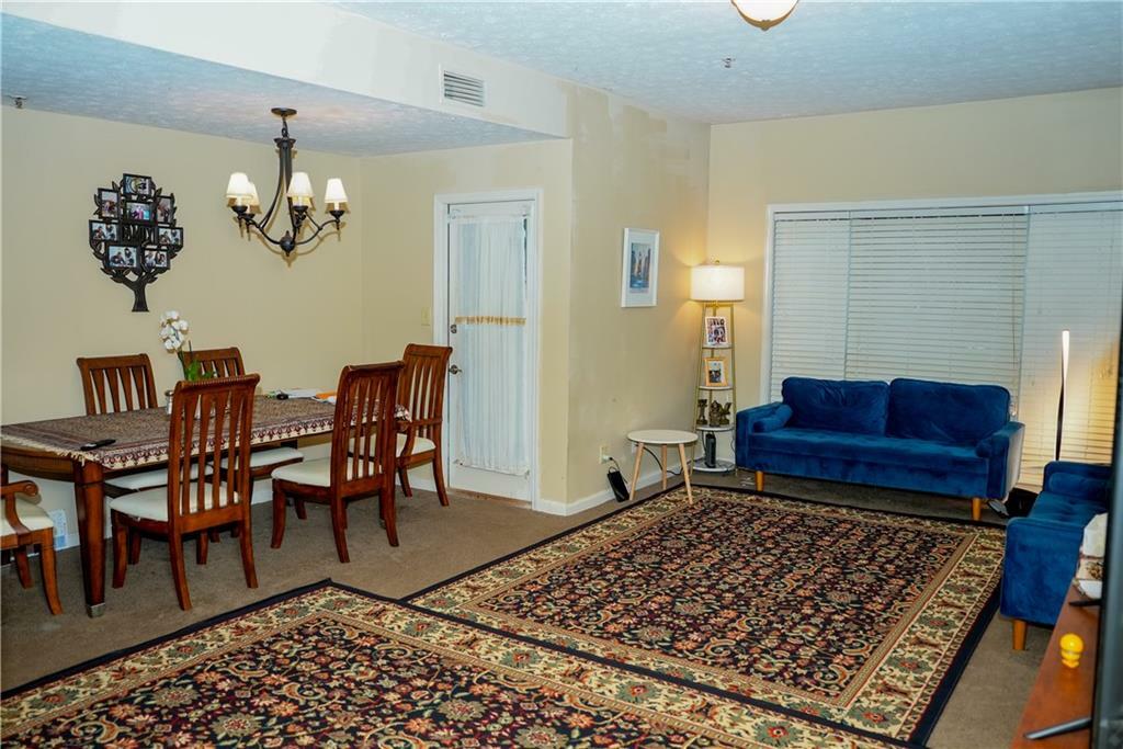 Property Photo:  1250 Parkwood Circle SE 1004  GA 30339 