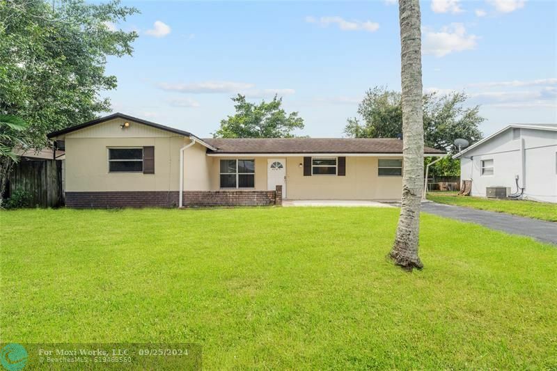 Property Photo:  6740 NW 6th Ct  FL 33063 