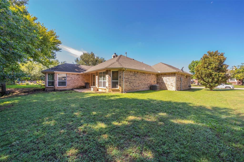 Property Photo:  310 Mitchell Boulevard  TX 76087 