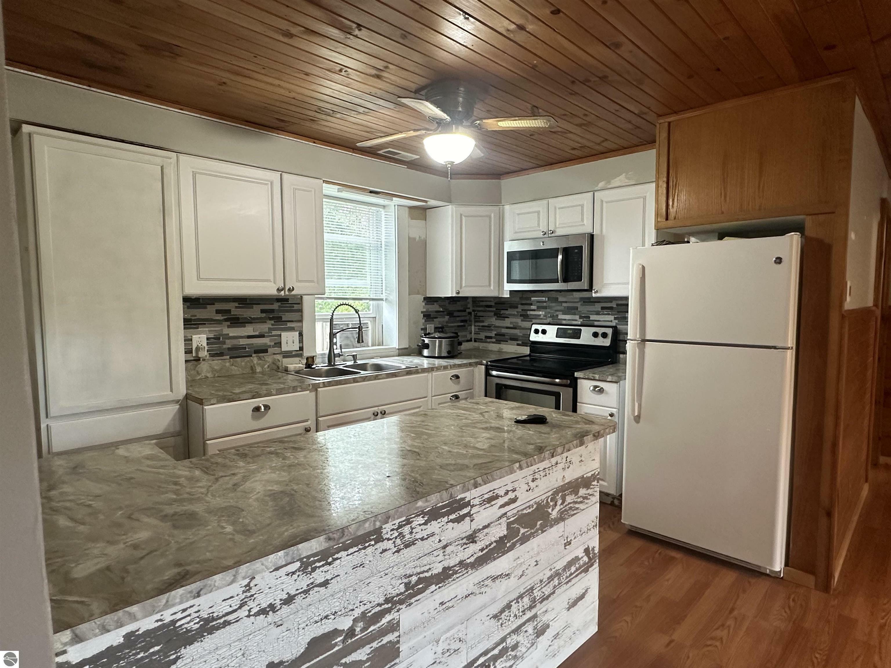 Property Photo:  6199 SW Supply Road  MI 49680 