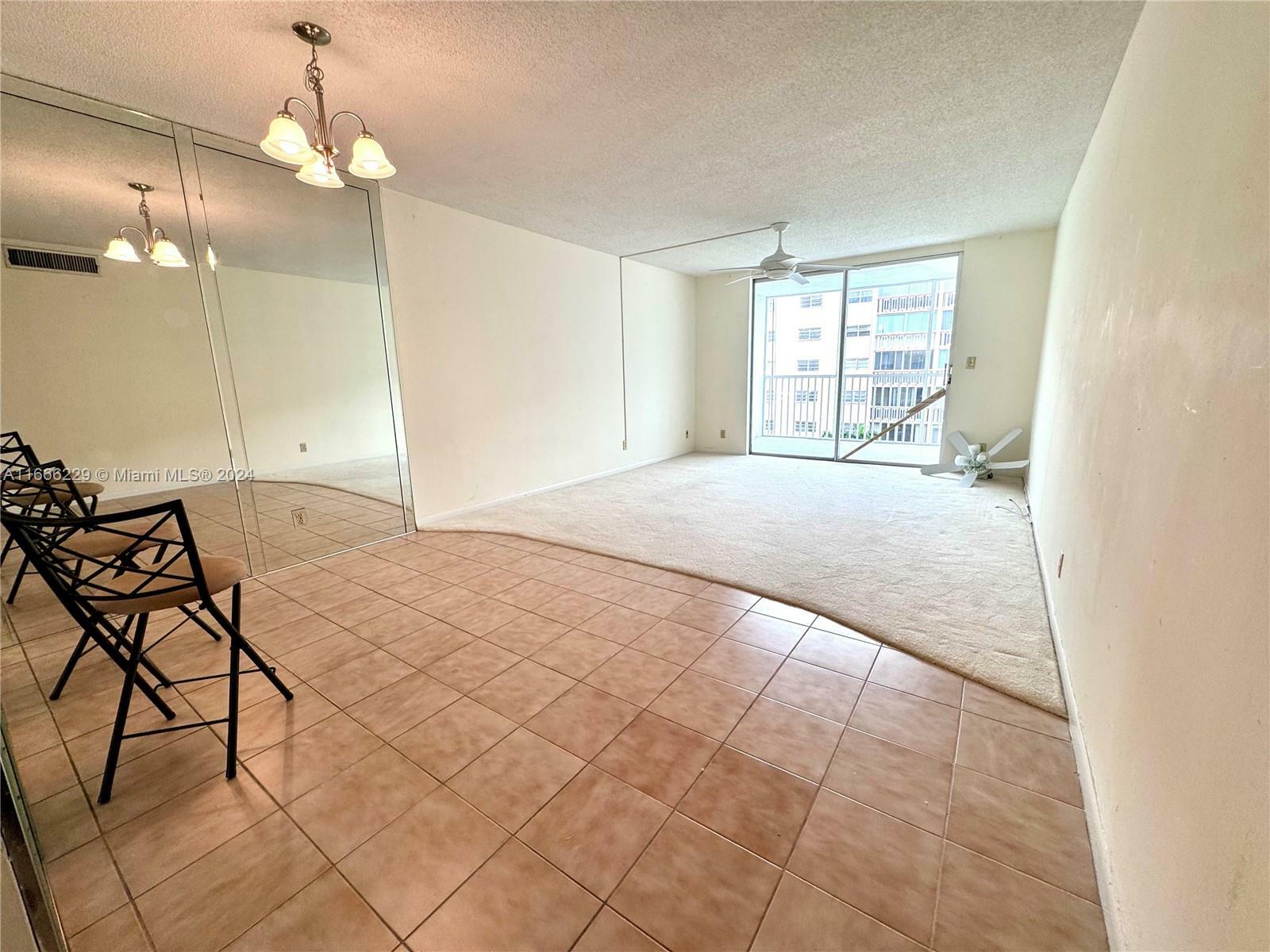 Property Photo:  319 NE 14th Ave 406  FL 33009 