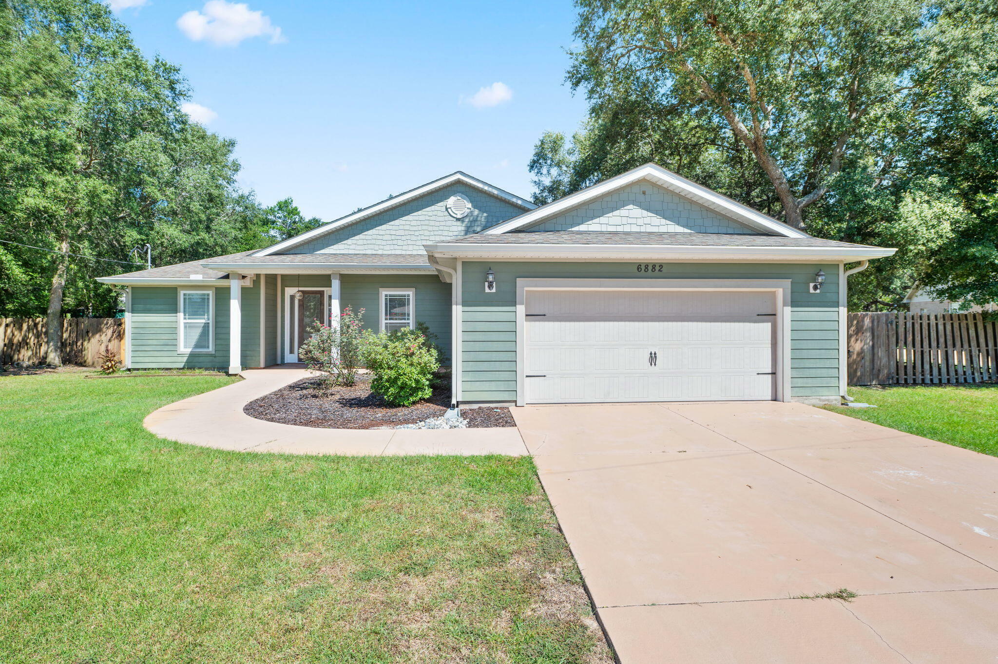 Property Photo: 6882 Brocado Court FL 32566