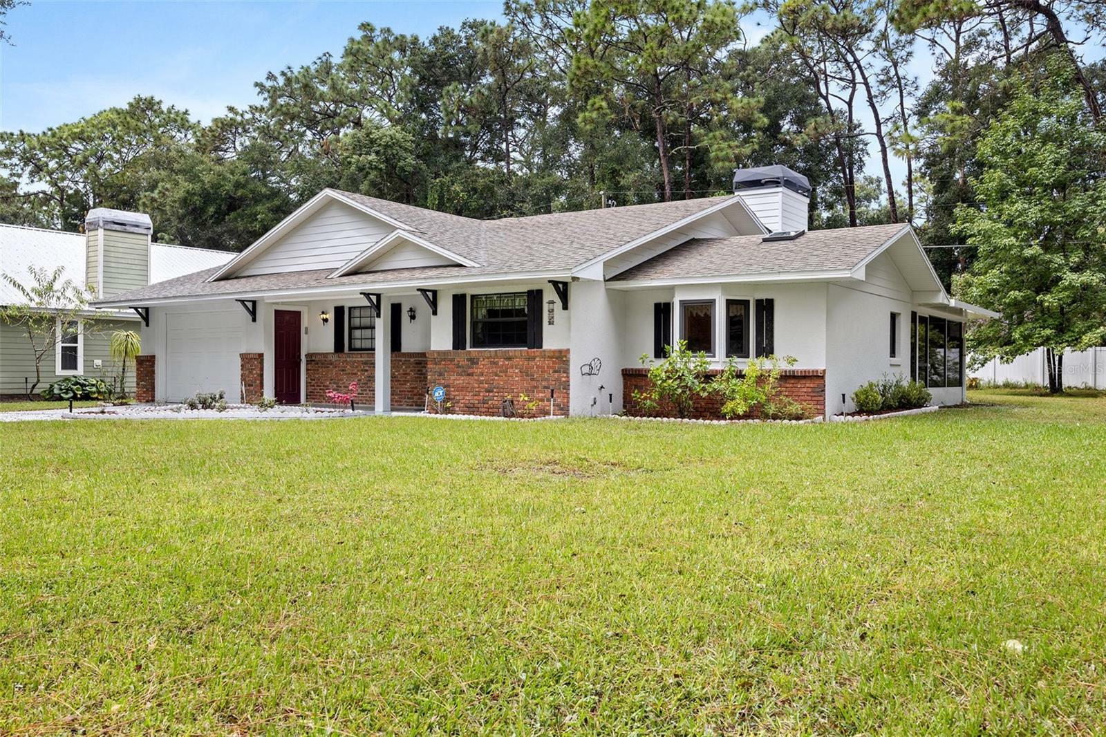 Property Photo:  26225 Troon Avenue  FL 32776 