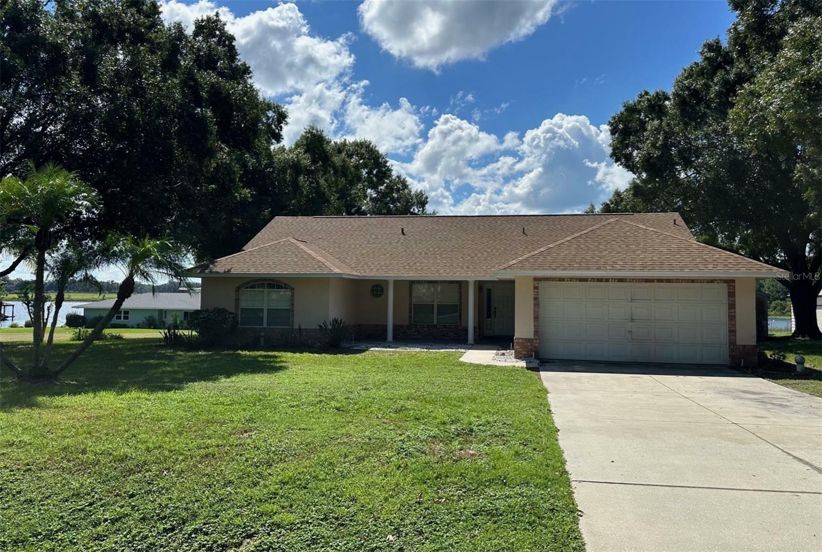 Property Photo:  10926 Point Nellie Drive  FL 34711 