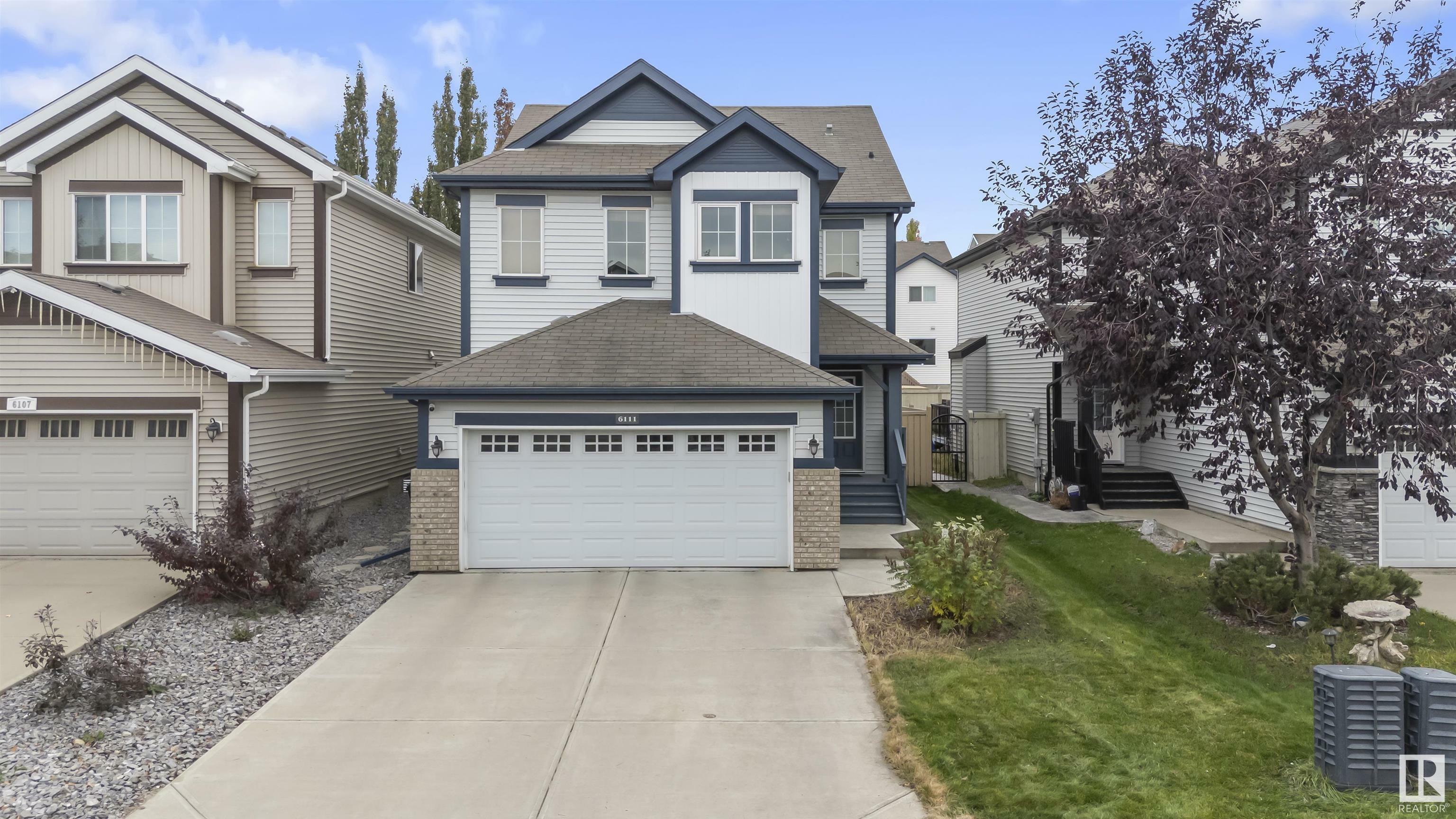 Property Photo:  6111 10 Avenue SW  AB T6X 0M3 