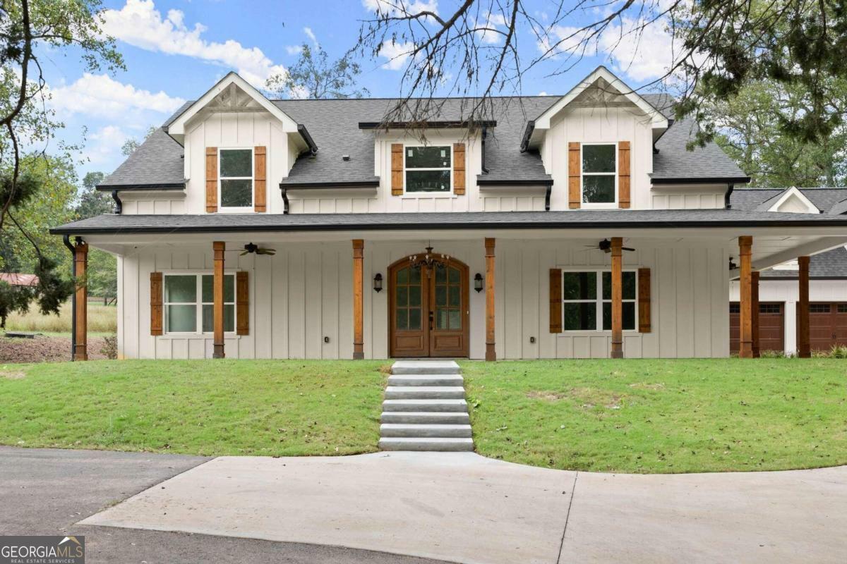 Property Photo:  4450 Three Bridges Road  GA 30543 