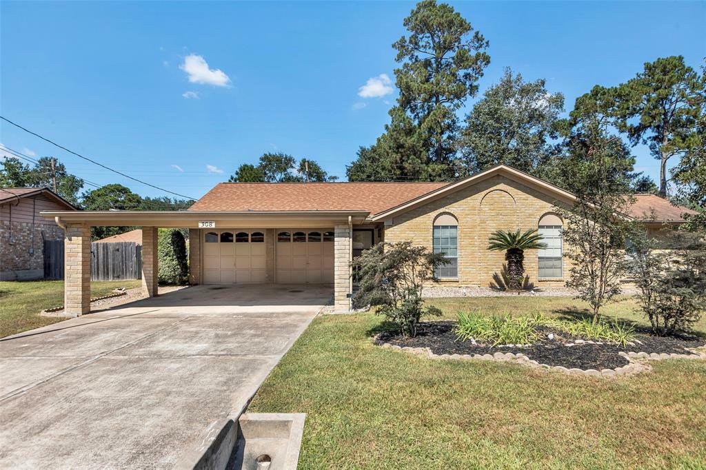 Property Photo:  308 Maple Lane  TX 77304 