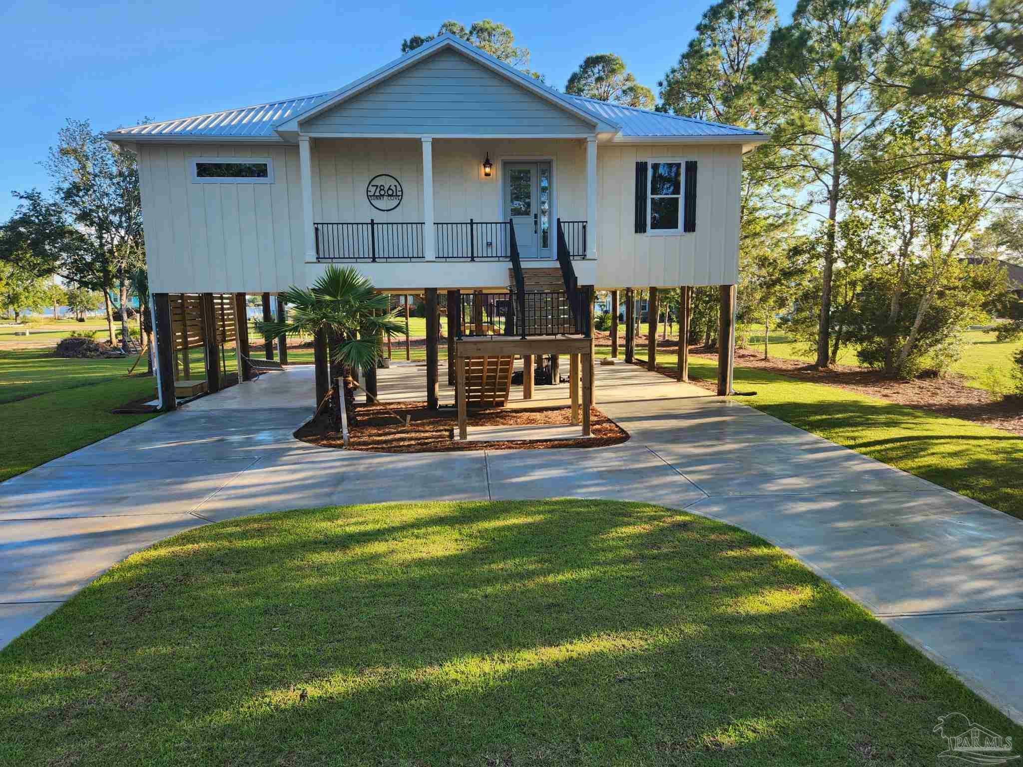 Property Photo:  7861 Sunny Cv  FL 32583 