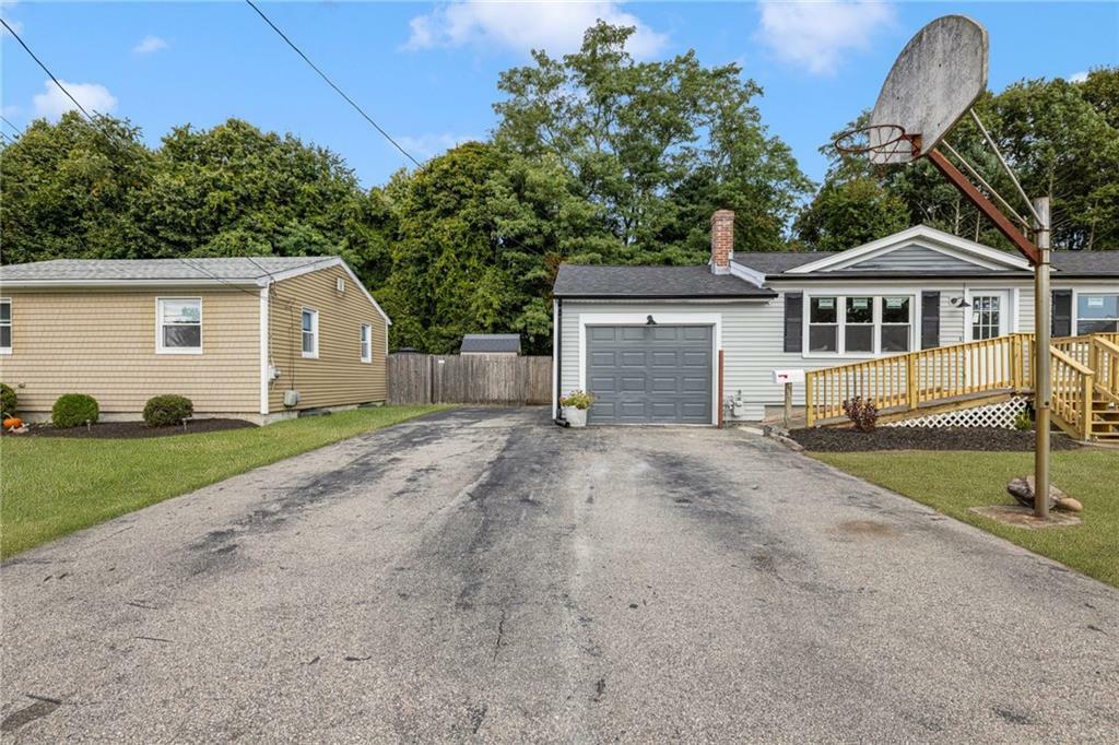 Property Photo:  130 Zinnia Drive  RI 02920 