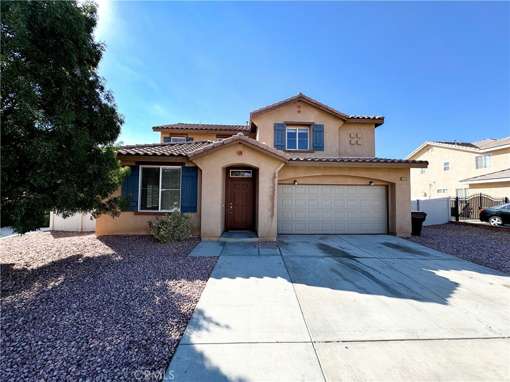 Property Photo:  12319 Ojo Caliente Street  CA 92392 