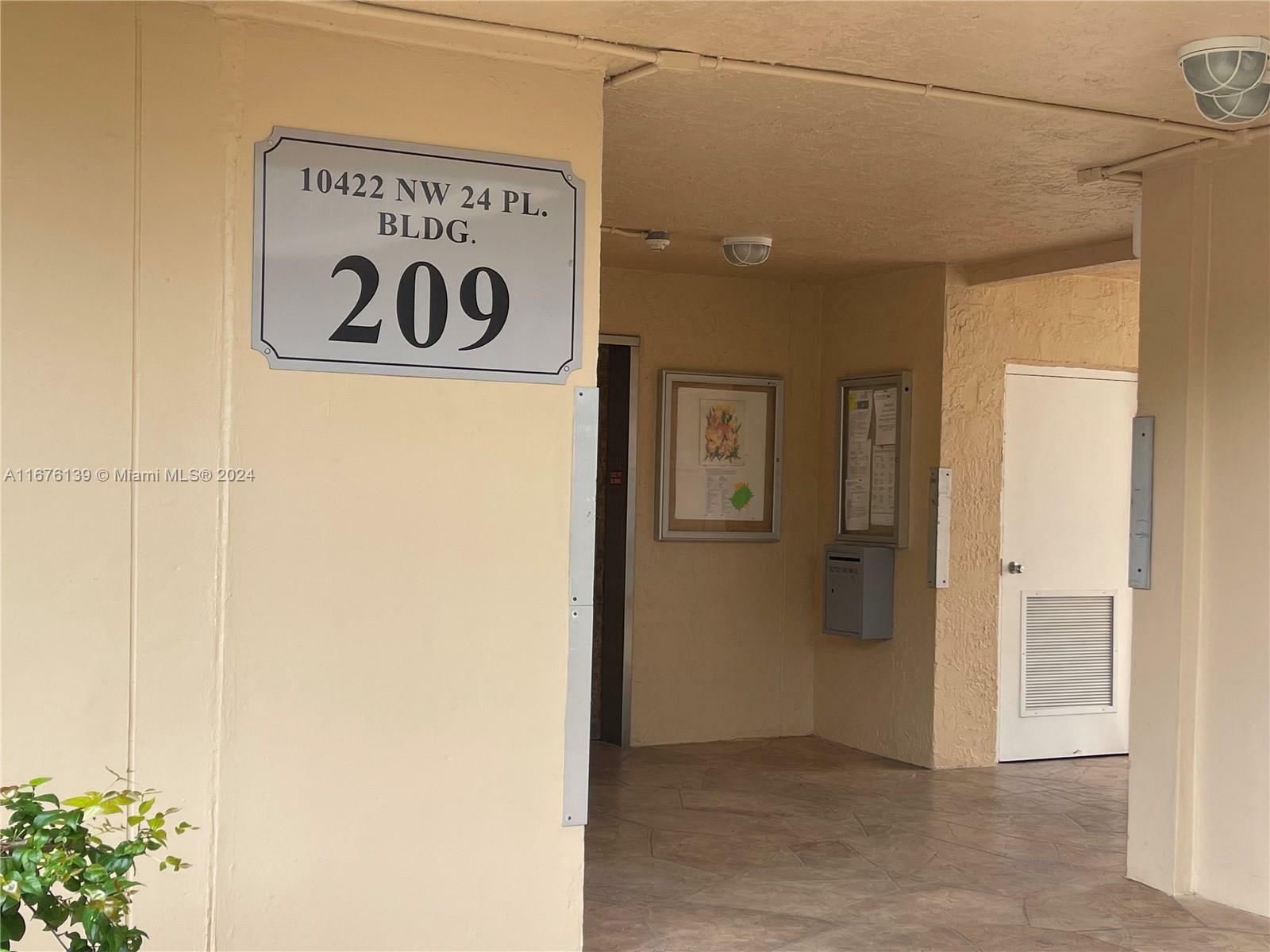 Property Photo:  10422 NW 24th Pl 409  FL 33322 