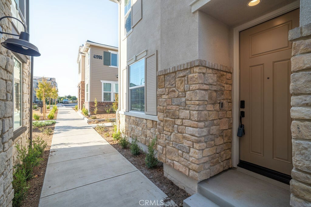 Property Photo:  41983 Ornella Street 604  CA 92562 