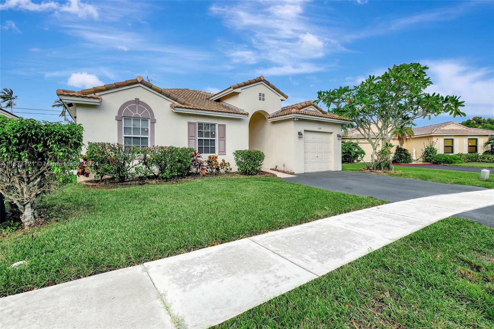 Property Photo:  11909 SW 17th  Ct  FL 33025 