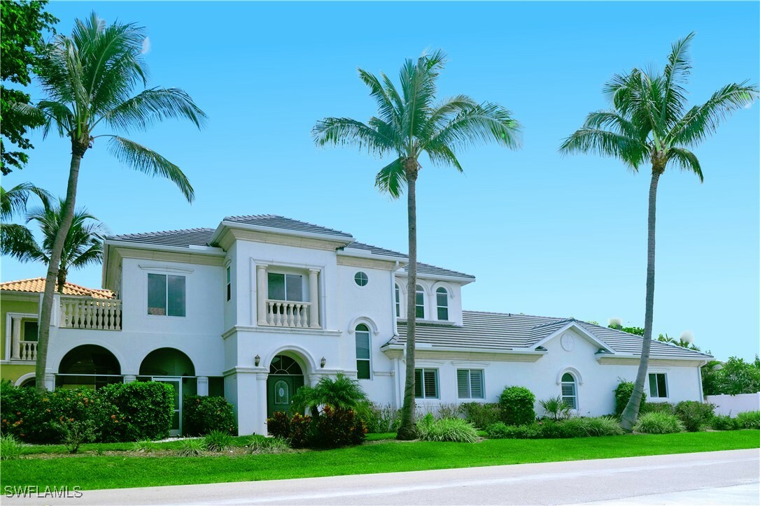 Property Photo: 11002 Vanderbilt Drive FL 34108