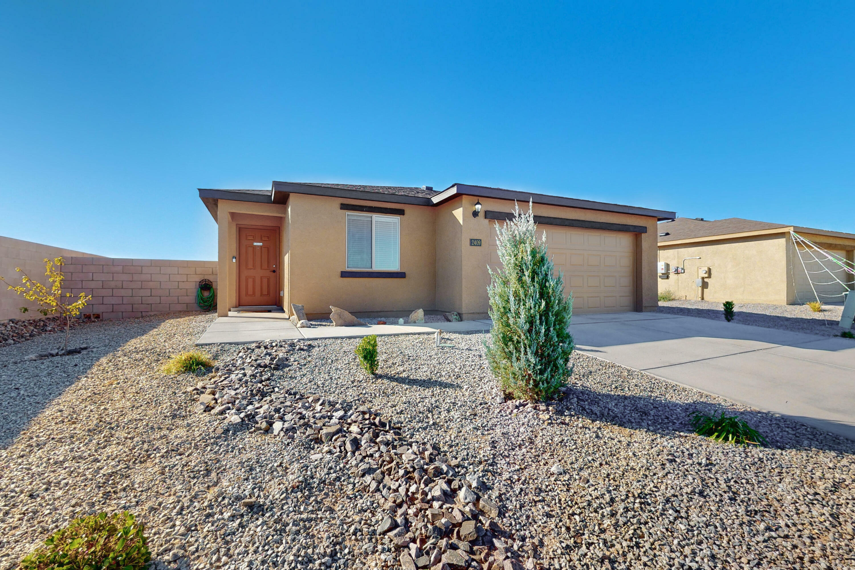 Property Photo:  2409 Calle Del Los Claveles  NM 87002 