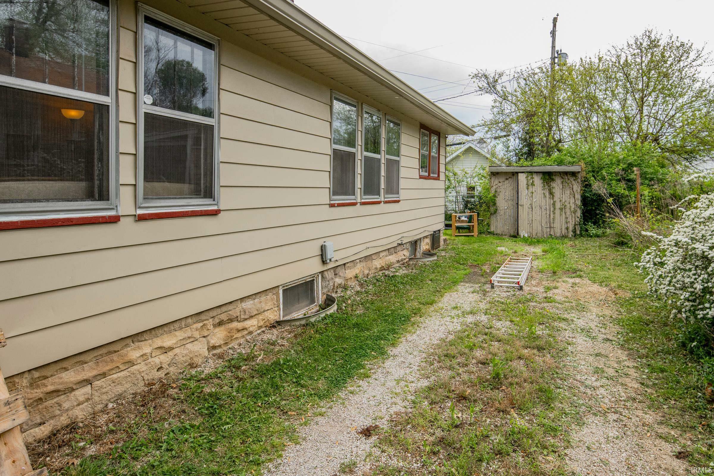 Property Photo:  711 W Cherokee Drive  IN 47403 